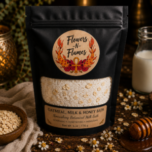 Flowers N Flames Oatmeal, Milk & Honey Bath in a black stand-up pouch with a kraft label, surrounded by rolled oats, honey, milk, and botanical ingredients on a rustic wooden surface.