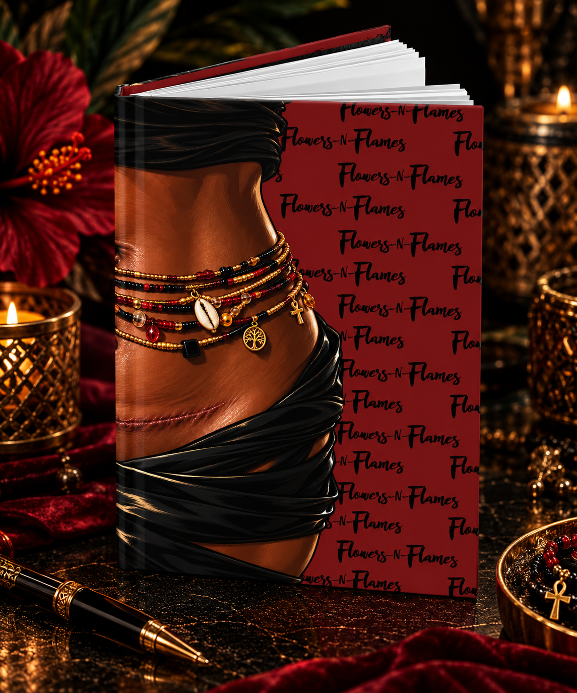 Marked & Adorned hardcover journal featuring artwork of a Black woman’s abdomen with a C-section scar, layered waist beads, and black wrap against a deep red Flowers N Flames background.
